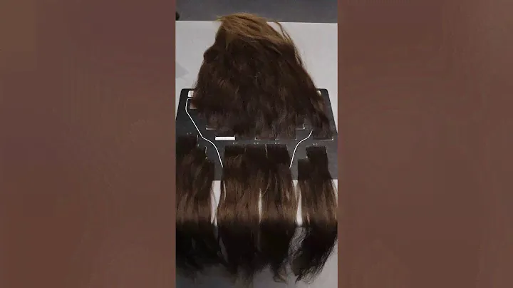 Hair extensions with adhesive tapes. Factory "Kaluga hair"
