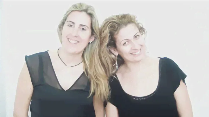 Two beautiful blondies modelling her long hair